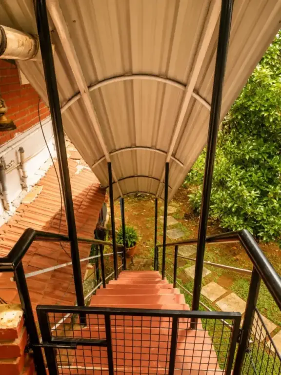 Covered staircase down to the garden